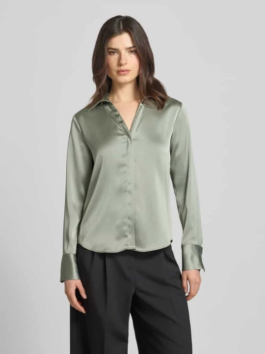 Zdjęcie produktu bluzka o kroju regular fit z dekoltem w serek Calvin Klein Trzcinowy