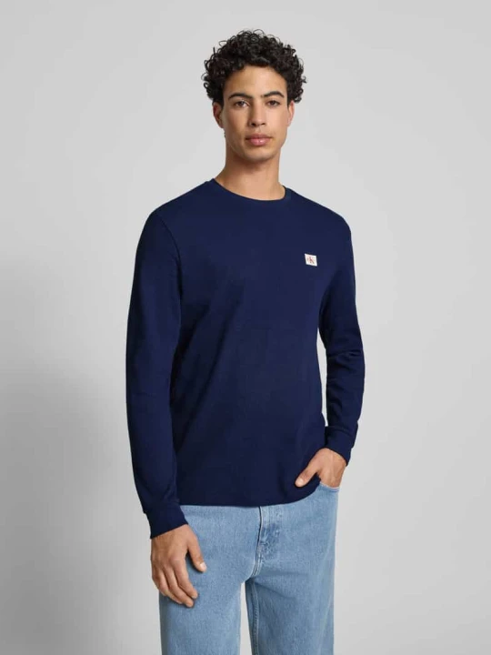 Zdjęcie produktu Bluzka o kroju slim fit z długim rękawem i naszywką z logo model ‘Waffle’ Calvin Klein Jeans Granatowy