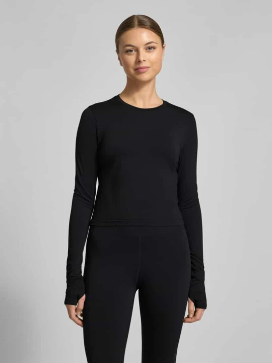 Zdjęcie produktu Bluzka z długim rękawem o kroju slim fit z okrągłym dekoltem model 'Feather' Fabletics Czarny