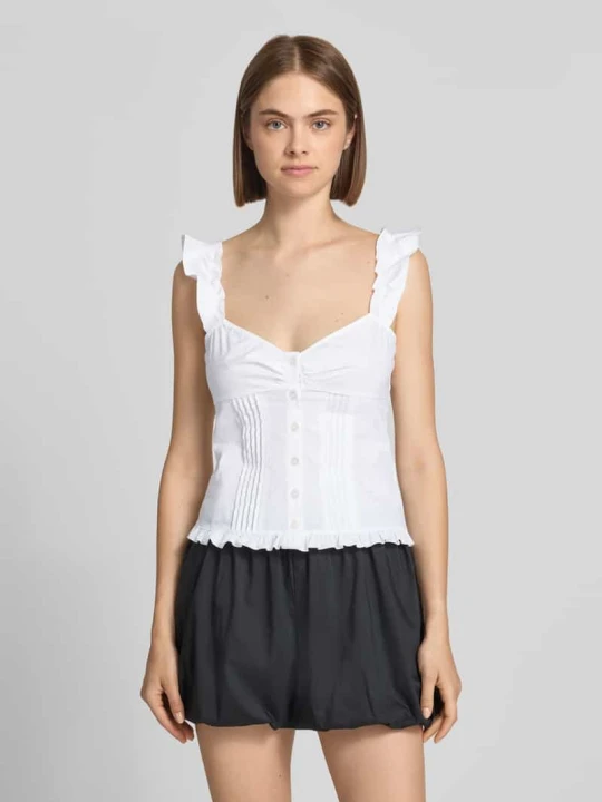 Zdjęcie produktu bluzka o kroju slim fit z obszyciem falbanami Gina Tricot Biały