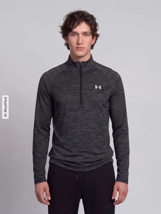 Zdjęcie produktu bluzka sportowa z długim rękawem w kroju regular fit z nadrukiem z logo Under Armour Czarny