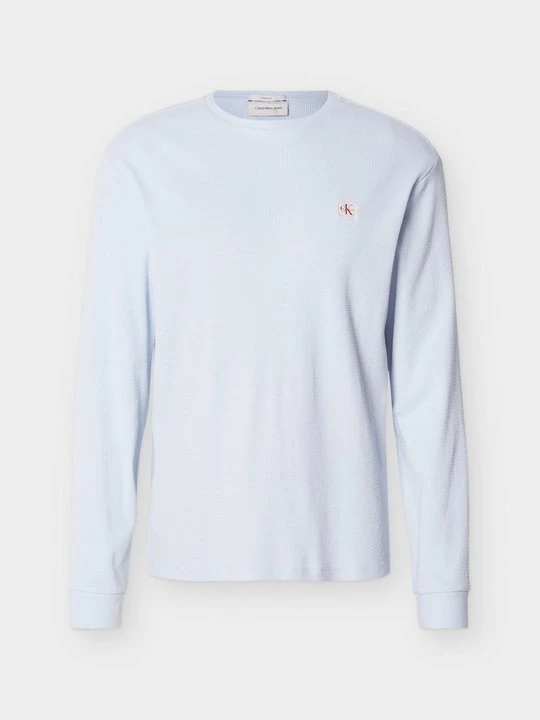 Zdjęcie produktu Bluzka z długim rękawem Calvin Klein Jeans jasnoniebieski