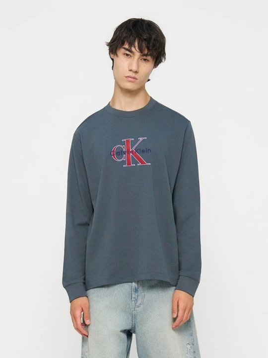 Zdjęcie produktu Bluzka z długim rękawem Calvin Klein Jeans niebieski