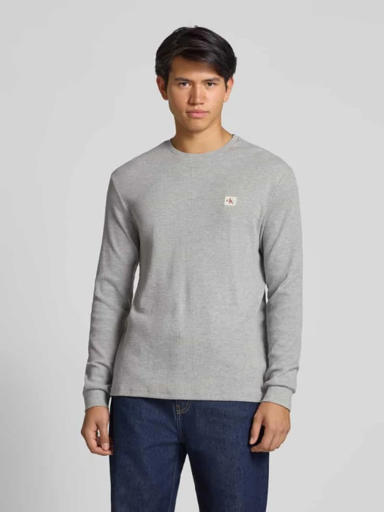Zdjęcie produktu Bluzka z długim rękawem i fakturowanym wzorem Calvin Klein Jeans Jasnoszary melanż
