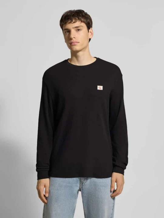 Zdjęcie produktu Bluzka z długim rękawem i detalem z logo Calvin Klein Jeans Czarny