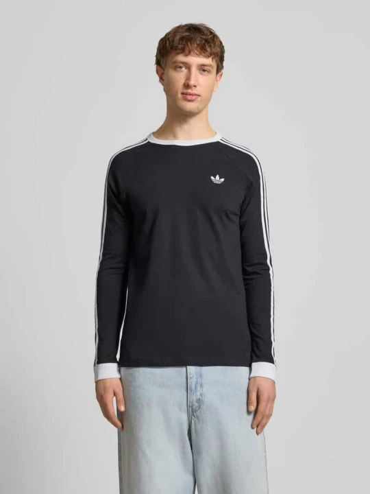 Zdjęcie produktu Bluzka z długim rękawem z prążkowanymi wykończeniami adidas Originals Czarny