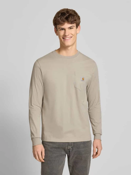 Zdjęcie produktu Bluzka z długim rękawem z brustaszą i detalem z logo Carhartt WIP Beżowy
