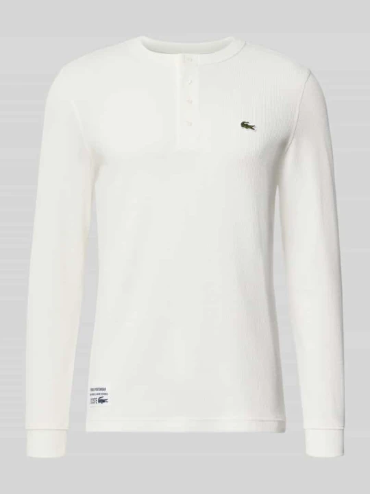 Zdjęcie produktu Bluzka z długim rękawem o kroju regular fit z czystej bawełny Lacoste Złamany biały