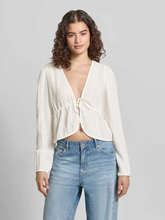 Zdjęcie produktu bluzka z długim rękawem o kroju regular fit z czystej bawełny model 'SASTINA' Pieces Złamany biały