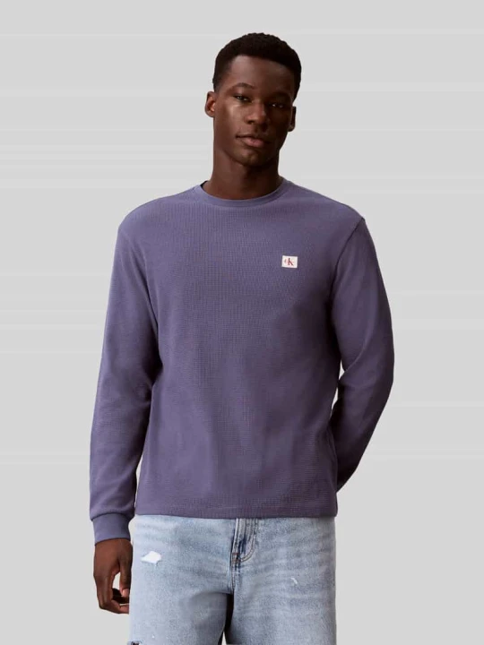 Zdjęcie produktu Bluzka z długim rękawem o kroju regular fit z mieszanki bawełny Calvin Klein Jeans Jeansowy niebieski