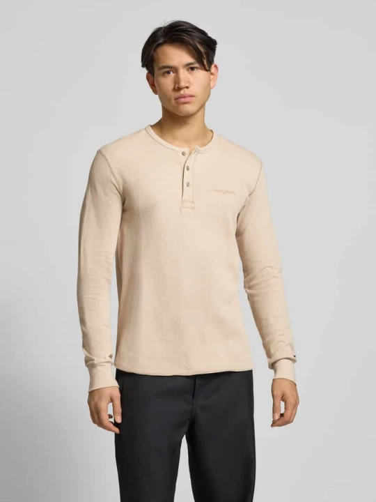 Zdjęcie produktu Bluzka z długim rękawem o kroju regular fit z mieszanki dżerseju i bawełny Tommy Jeans Beżowy