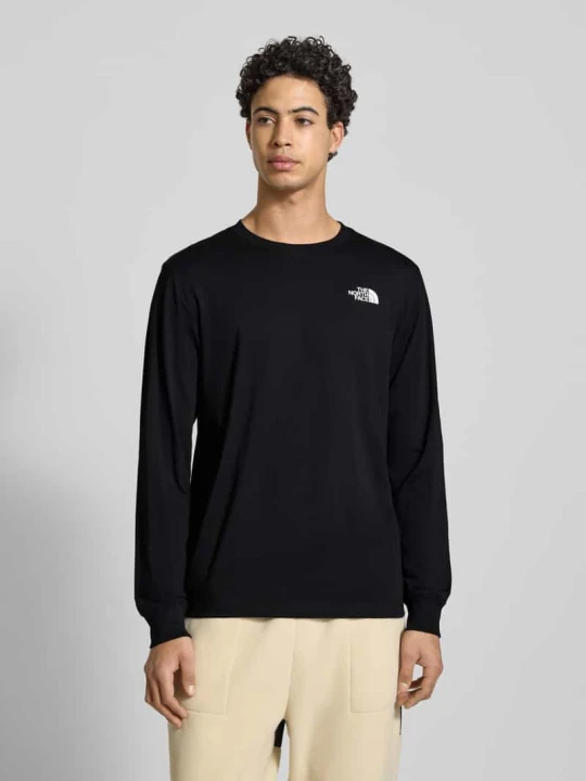 Zdjęcie produktu Bluzka z długim rękawem o kroju regular fit z nadrukiem z logo The North Face Czarny