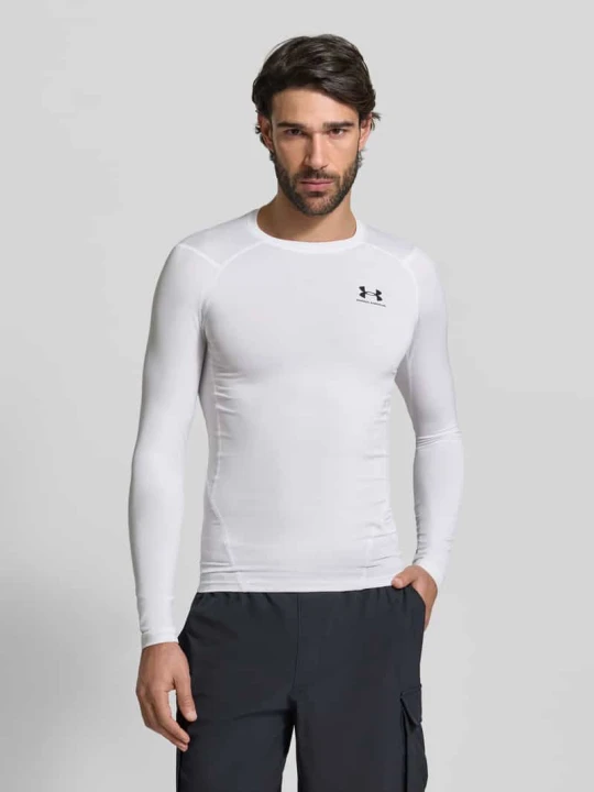 Zdjęcie produktu Longsleeve w kroju slim fit z nadrukiem logo Under Armour Biały