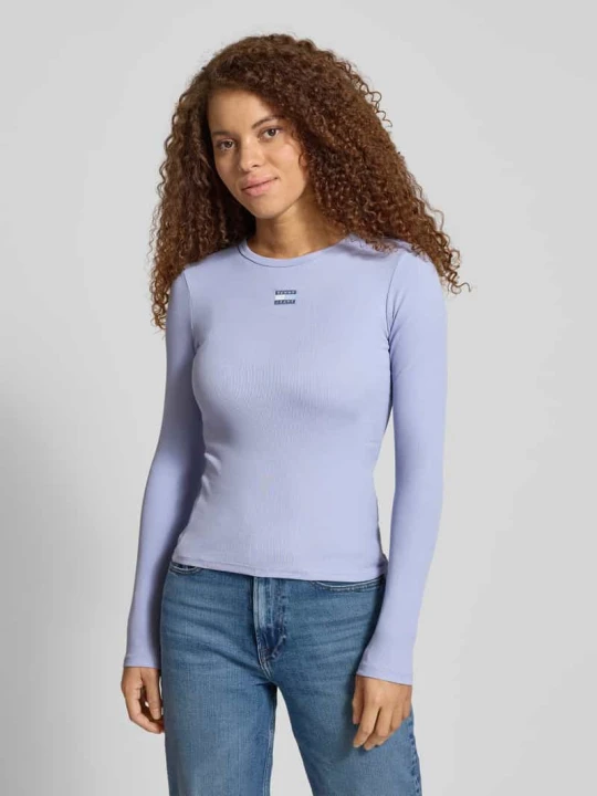 Zdjęcie produktu Bluzka z długim rękawem o kroju slim fit z mieszanki bawełny Tommy Jeans Lawendowy