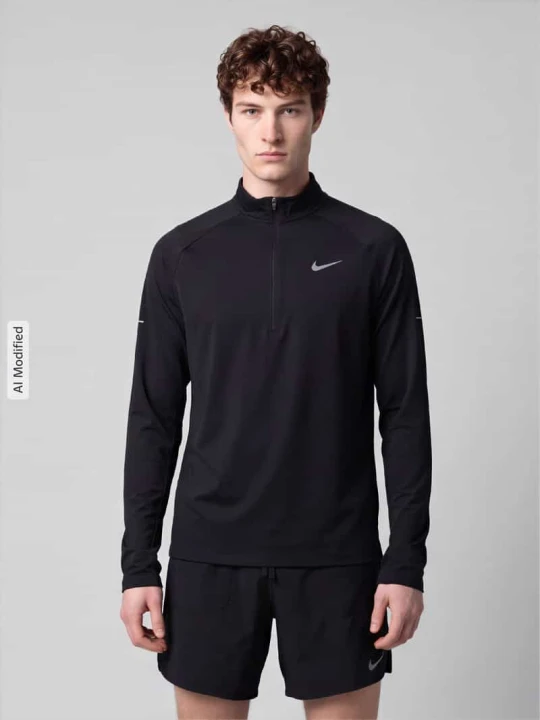 Zdjęcie produktu bluzka z długim rękawem sport o kroju regular fit z kołnierzem zapinanym Nike Czarny