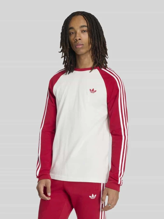 Zdjęcie produktu Bluzka z długim rękawem w kroju regular fit z czystej bawełny z wyhaftowanym logo adidas Originals Złamany biały