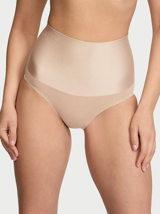 Zdjęcie produktu Body by Victoria Majtki modelujące z wysokim stanem Smoothing Shimmer Brief Victoria's Secret Beżowy
