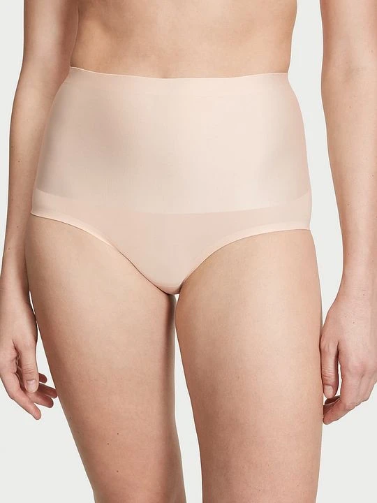 Zdjęcie produktu Body by Victoria Majtki modelujące z wysokim stanem Smoothing Shimmer Brief Victoria's Secret Beżowy