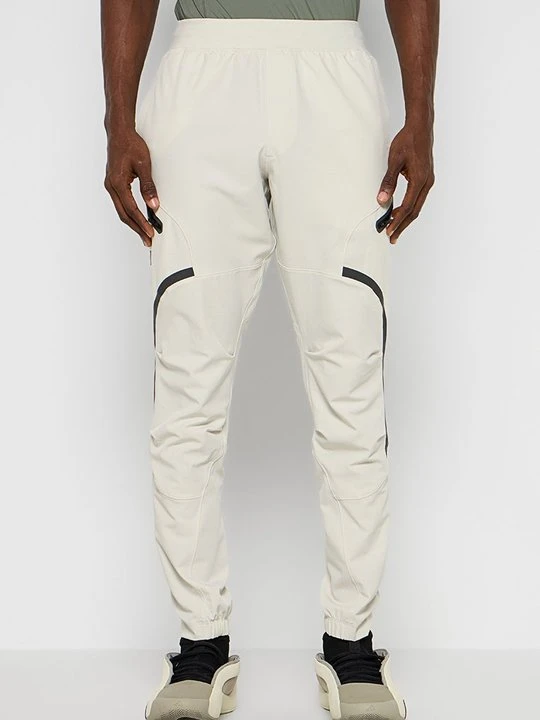 Zdjęcie produktu Bojówki Under Armour mleczny