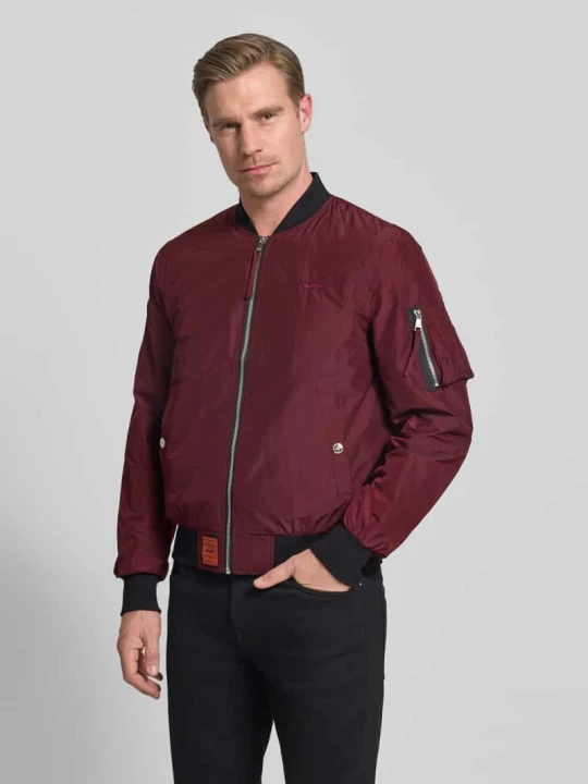 Zdjęcie produktu bomberka z naszywką z logo i wpuszczanymi kieszeniami ORIGINAL BOMBERS Bordowy