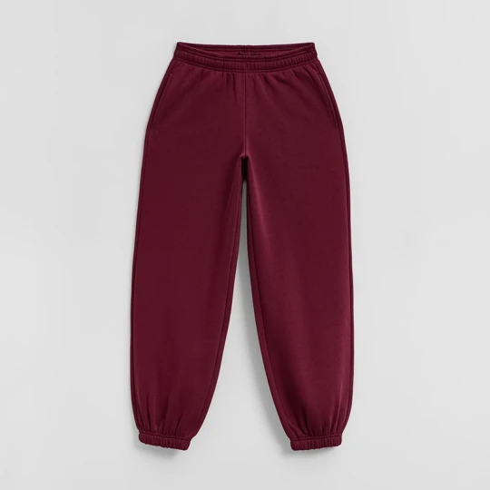 Zdjęcie produktu Bordowe spodnie dresowe basic o kroju jogger House