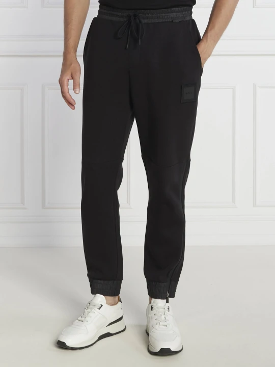 Zdjęcie produktu BOSS GREEN Spodnie dresowe Hover Lotus | Relaxed fit czarny
