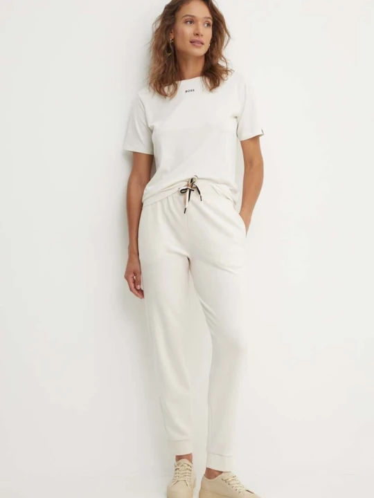 Zdjęcie produktu BOSS spodnie lounge damskie CP Stripe Pants Cuff beżowy