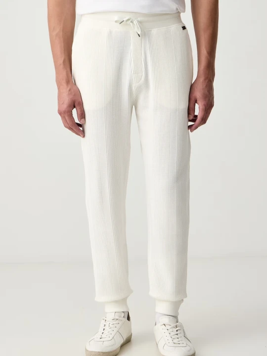 Zdjęcie produktu BOSS spodnie lounge męskie z bawełną Structure Pants beżowy