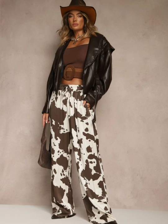 Zdjęcie produktu Brązowe Szerokie Spodnie High Waist z Wiskozy w Print w Krowie Łaty Nelianta Jumelle