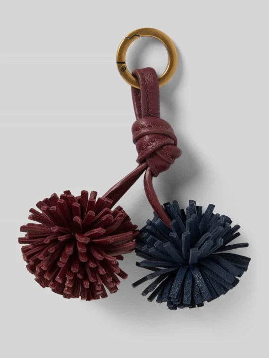 Zdjęcie produktu Brelok do kluczy z wiązanym detalem model 'Pom Pom' Liebeskind Bordowy