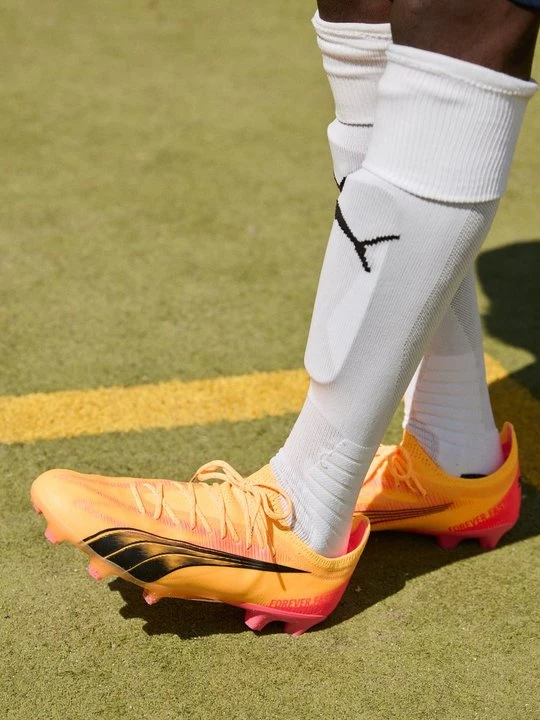 Zdjęcie produktu Buty piłkarskie na twardą nawierzchnię Puma żółty melanż