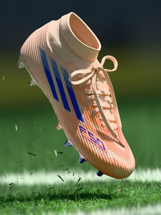 Zdjęcie produktu Buty piłkarskie na twardą nawierzchnię Adidas pomarańczowy