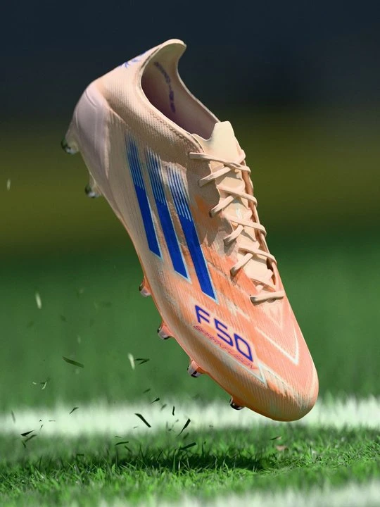 Zdjęcie produktu Buty piłkarskie na twardą nawierzchnię Adidas pomarańczowy