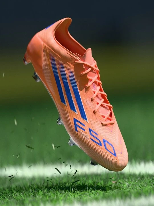 Zdjęcie produktu Buty piłkarskie na twardą nawierzchnię Adidas pomarańczowy