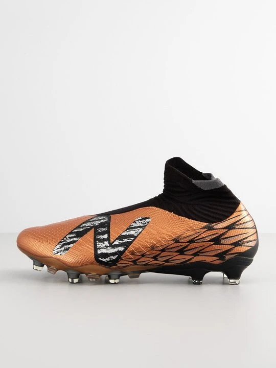 Zdjęcie produktu Buty piłkarskie na twardą nawierzchnię New Balance miedziany