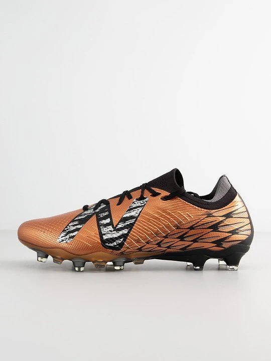Zdjęcie produktu Buty piłkarskie na twardą nawierzchnię New Balance miedziany