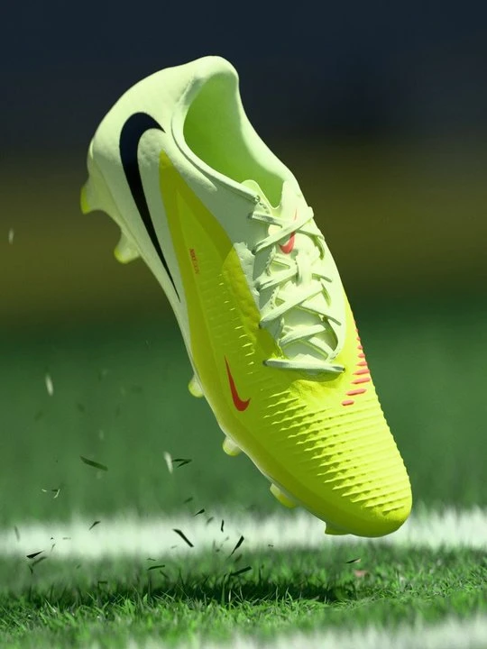 Zdjęcie produktu Buty piłkarskie na twardą nawierzchnię Nike pomarańczowy