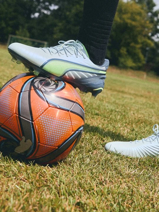 Zdjęcie produktu Buty piłkarskie na twardą nawierzchnię Puma jasnoszary