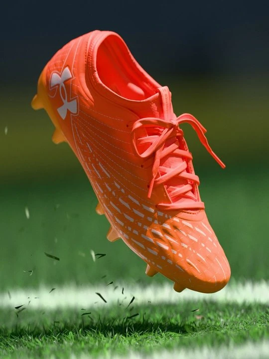 Zdjęcie produktu Buty piłkarskie na twardą nawierzchnię Under Armour pomarańczowy