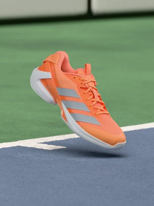 Zdjęcie produktu Buty tenisowe uniwersalne Adidas pomarańczowy