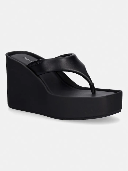 Zdjęcie produktu Calvin Klein japonki damskie skórzane WEDGE 70 SNDL THONG LTH czarny