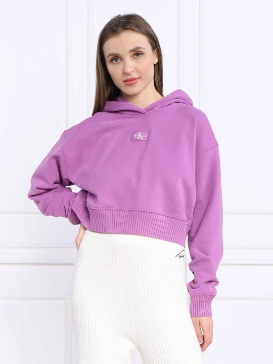 Zdjęcie produktu Calvin Klein Jeans Bluza BADGE WIDE SLEEVES | Cropped Fit fioletowy