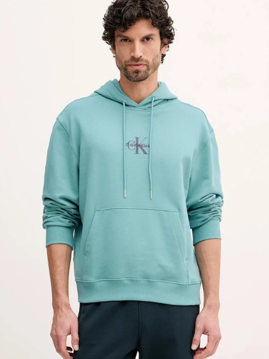 Zdjęcie produktu Calvin Klein Jeans bluza z kapturem męska bawełniana turkusowy