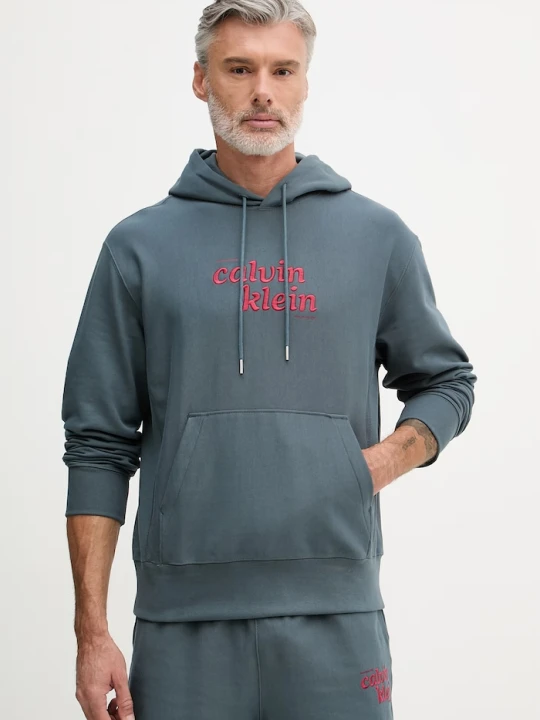Zdjęcie produktu Calvin Klein Jeans bluza z kapturem męska z bawełną turkusowy