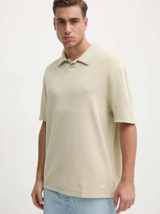 Zdjęcie produktu Calvin Klein Jeans polo bawełniane beżowy