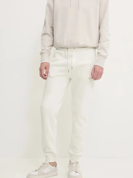Zdjęcie produktu Calvin Klein Jeans spodnie dresowe beżowy