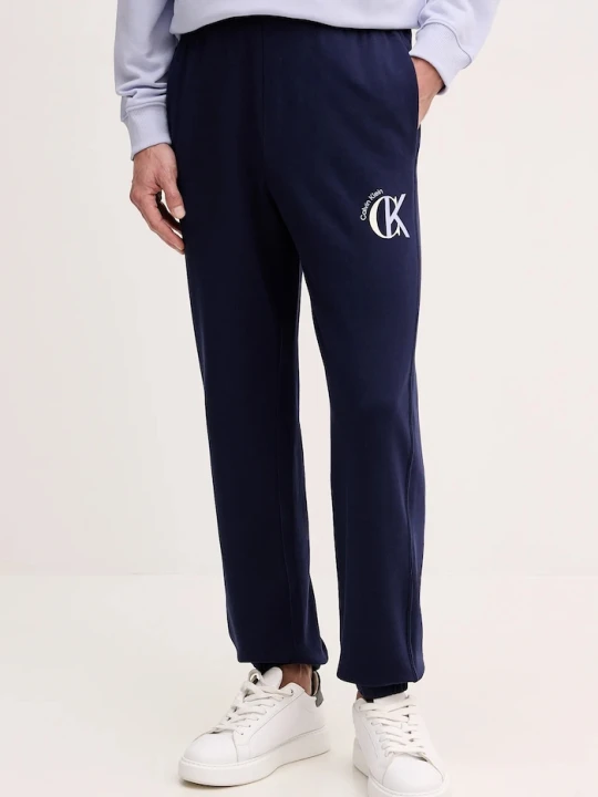 Zdjęcie produktu Calvin Klein Jeans spodnie dresowe bawełniane granatowy