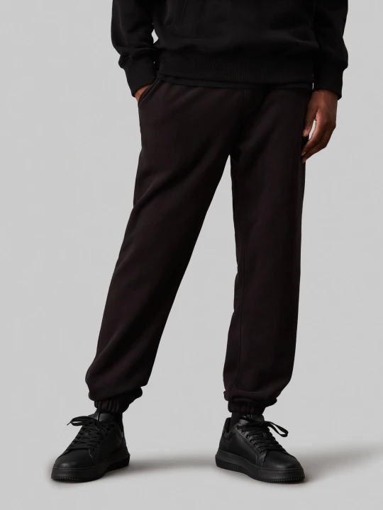 Zdjęcie produktu Calvin Klein Jeans Spodnie dresowe CHENILLE | Regular Fit czarny