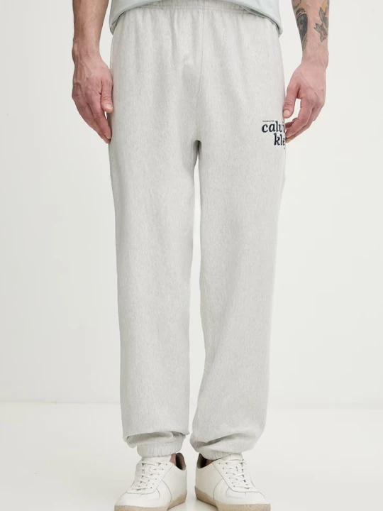 Zdjęcie produktu Calvin Klein Jeans spodnie dresowe męskie z bawełną szary