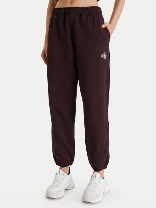 Zdjęcie produktu Calvin Klein Jeans Spodnie dresowe Monologo LV047B235G Brązowy Regular Fit